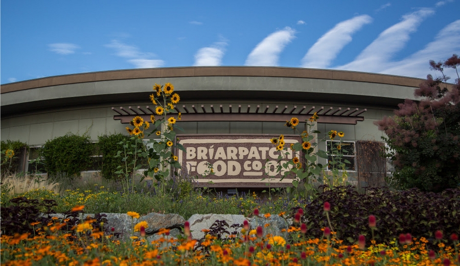 Briar Patch Food Co-Op exterior with flowers